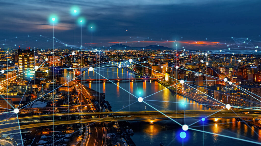 Modern cityscape and communication network concept. Telecommunication. IoT (Internet of Things). Smart city. Digital transformation.